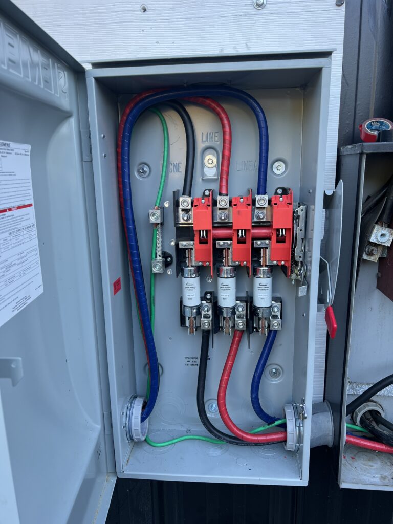 Commercial solar electrical disconnect and service equipment installed by Alexa Energy Power Solutions