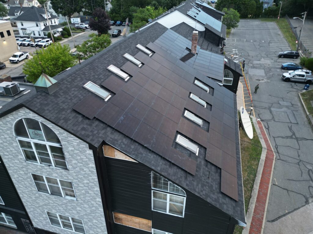 Fazza Commons rooftop solar panels installed around skylights by Alexa Energy Power Solutions