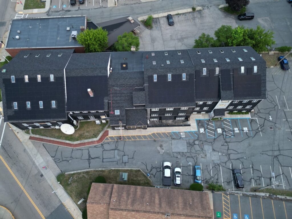 Top-down drone view of the Fazza Commons rooftop solar installation by Alexa Energy Power Solutions
