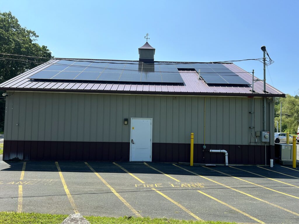 Solar array on the rear metal roof of Mammoth Convenience