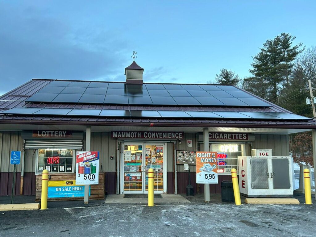 Mammoth Convenience with rooftop solar panels on the metal roof