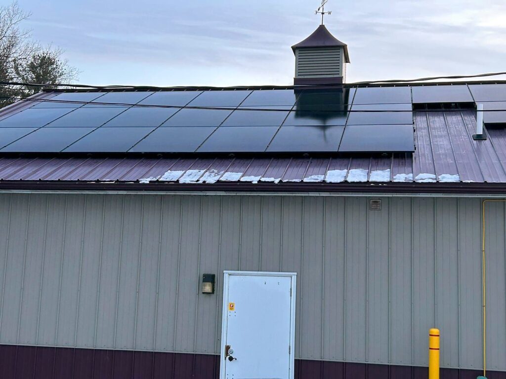 Solar panels on the rear roof of Mammoth Convenience in winter