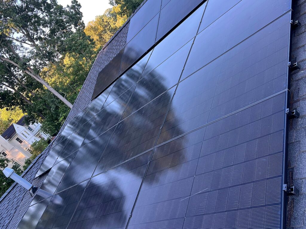 Residential solar panels installed along the roof edge