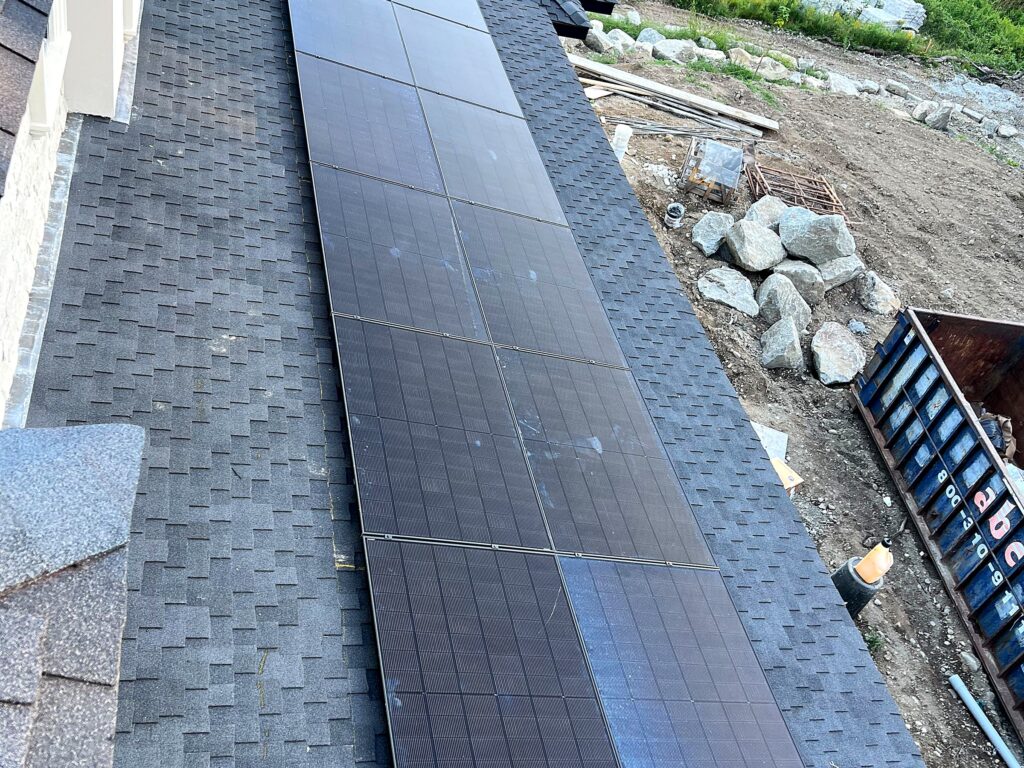 Two-column row of solar panels on a residential roof