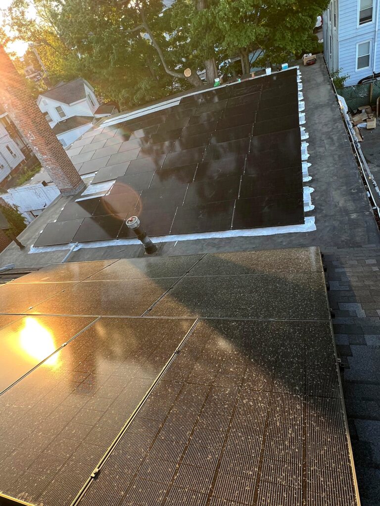 Overview of the flat and pitched roof solar arrays at Valencia Auto Repair