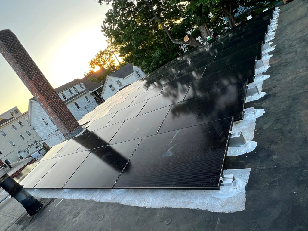 Solar array on the flat roof at sunset